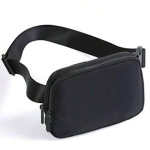 NEW Waterproof Fanny pack black & black zippers back compartment 6”x9”